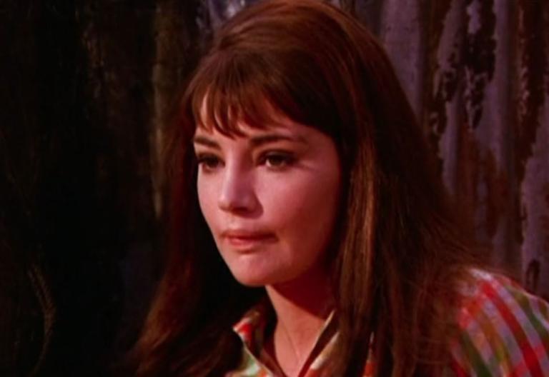 Film still of a young Jeanie Drynan looking worried.