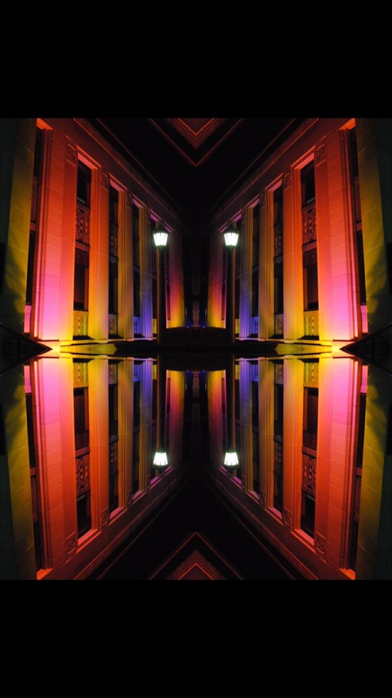 Yumi Morrissey's fabric pattern, featuring the NFSA building, illuminated at night