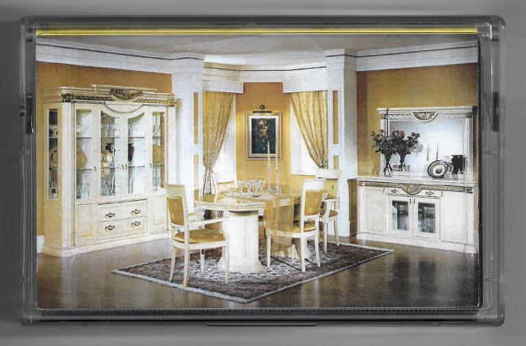 Cassette cover featuring the dining room of an expensive house.