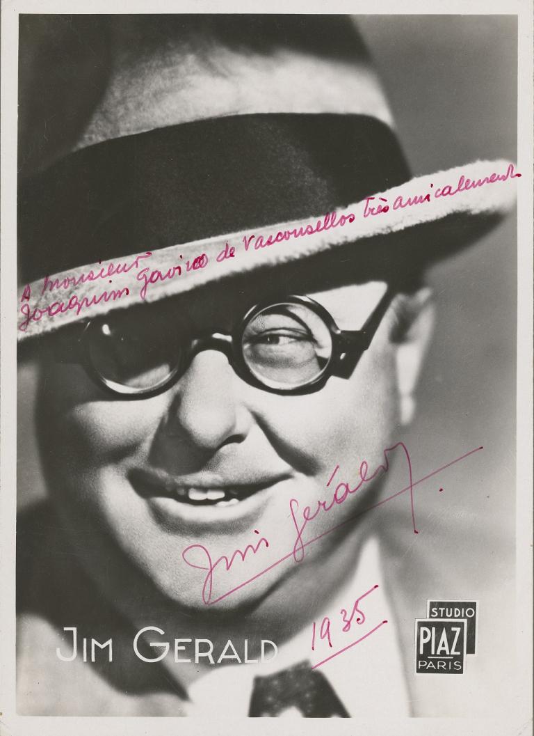 Close up of Jim Gerald wearing a hat and glasses.