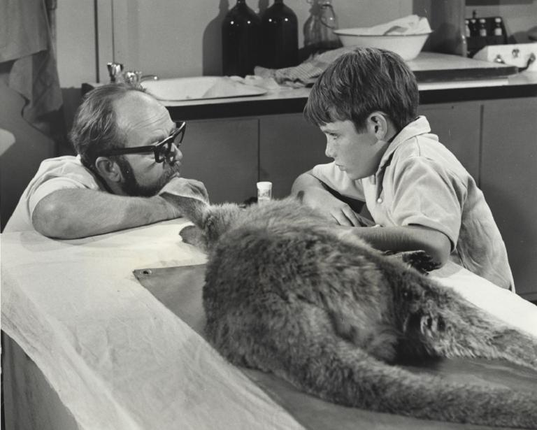 Director giving a young actor guidance on how to react to bad news.