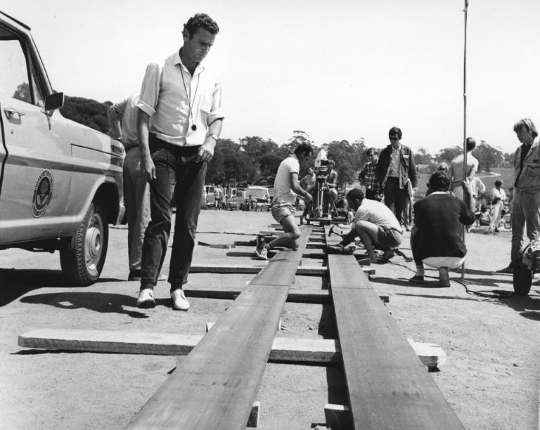Crew setting up dolly tracks for filming Skippy.