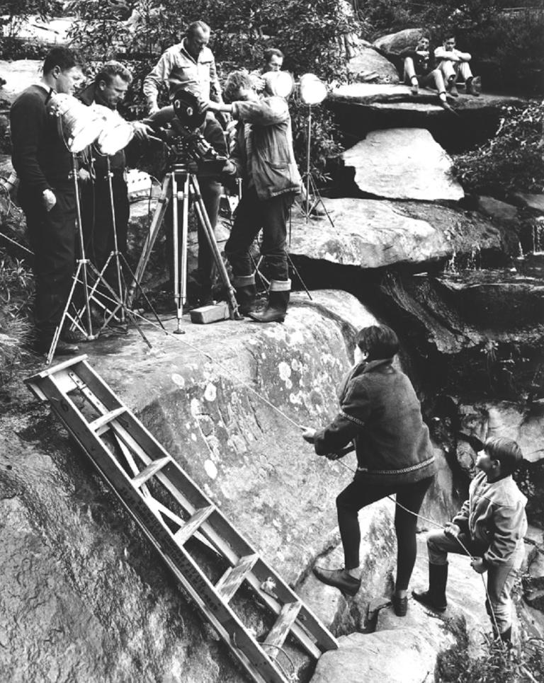Setting up a shot for Garry Pankurst and Gita Rivera to climb up a cliff.
