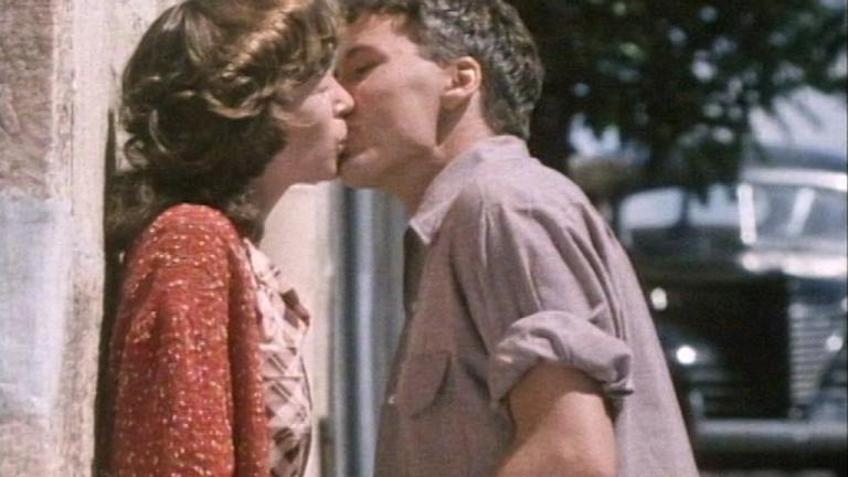 Charlie (Shane Connor) kisses Roie (Anna Hruby)