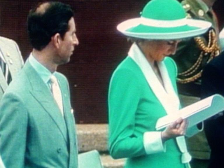 Charles, Prince of Wales, and Princess Diana at Bicentennary celebrations. Diana is wearing a green dress and hat with white trim.