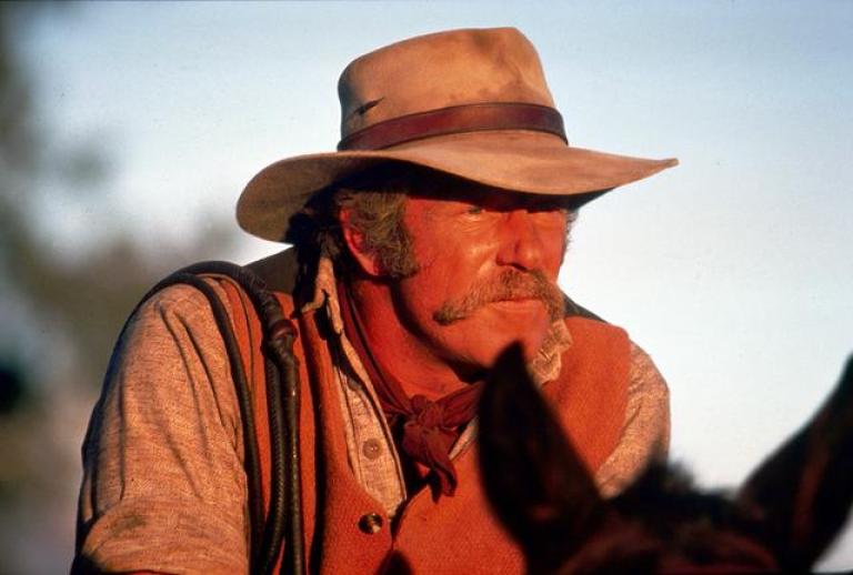 Close up of Jack Thompson as Clancy sitting on a horse