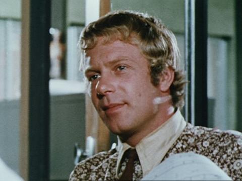 Jack Thompson in an office, wearing a tie