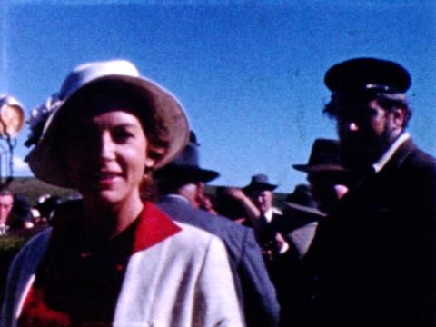 Actor Deborah Kerr pictured in a coat and hat behind the scenes of the film The Sundowners.