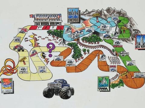 Artwork for a video game showing drawings of a map and a monster truck.