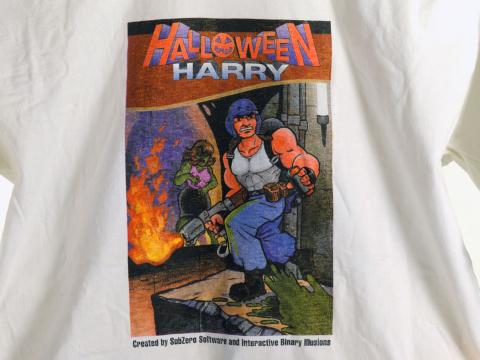Part of a t-shirt that has an image of a video game called Halloween Harry on the front.