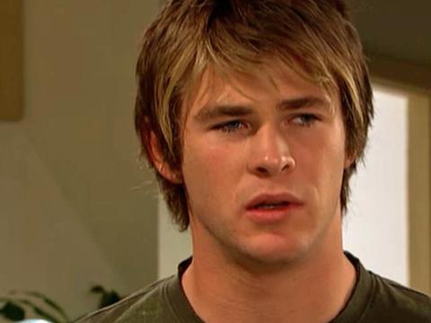 Chris Hemsworth looking uncertain in a scene from Home and Away