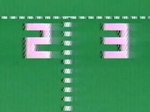 Close-up of a Pong scoreboard showing 2-3