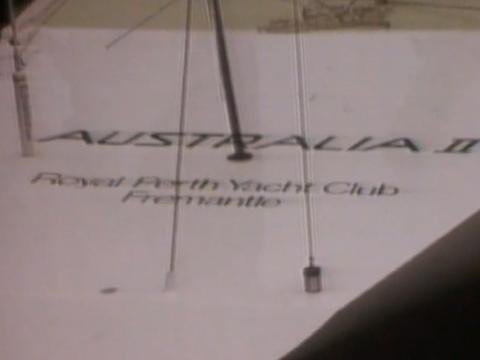 Close-up of the Australia II showing the name and club on the hull.