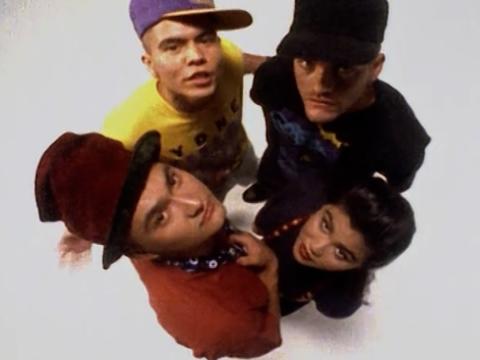 Top down shot of the members of Undersound standing in a close circle