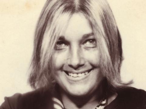Lillian Roxon is looking at the camera in what looks like a close-up of a photobooth photo.