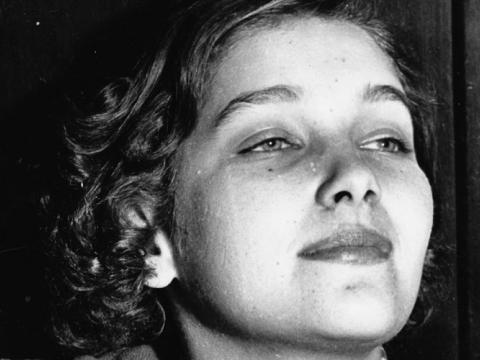 A young Lillian Roxon looks out into the distance.