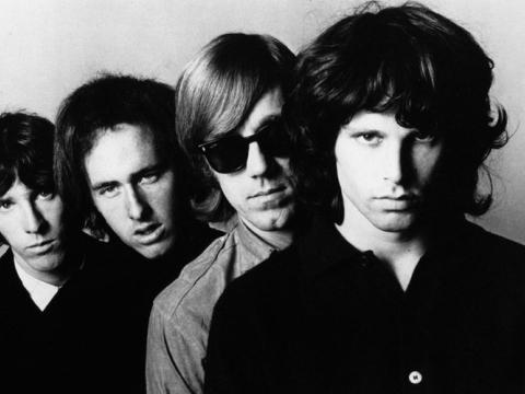 A photograph of The Doors with Jim Morrison out in front.