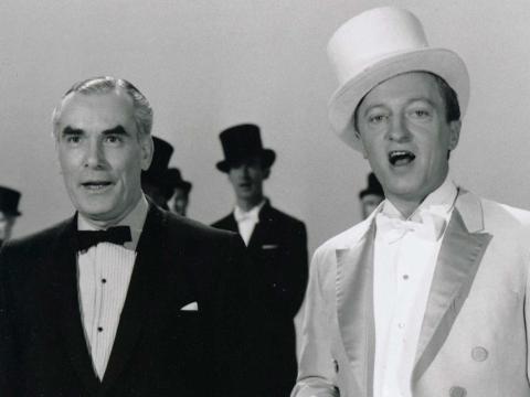 Eric Pearce in dinner suit and Graham Kennedy in white tails with top hat