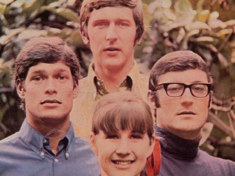 The Seekers looking at the camera in a still from an album cover.