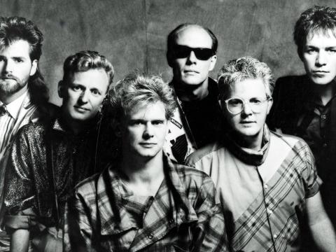 Six members of the Little River Band in 1985 with John Farnham in the centre.