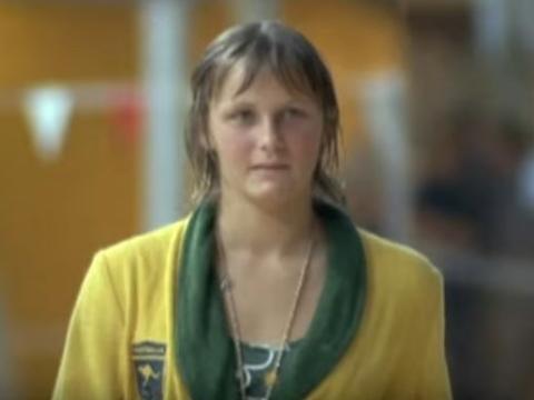 Shane Gould poolside wearing the Australian Olympic team's bathrobe