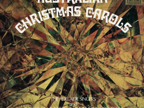 An album cover depicting an abstracted prismatic image of a star. Text reads 'WG James Australian Christmas Carols'.
