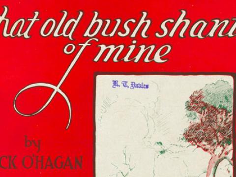 Close-up of a piece of sheet music. Text reads 'That old bush shanty of mine by Jack O'Hagan'.