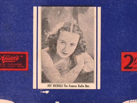 A photograph of singer Joy Nichols inset in a blue background with wavy lines.