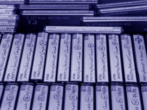 Close up image of rows of labelled cassette tapes