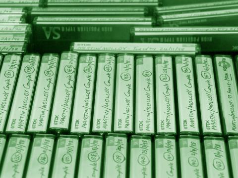 Close up image of rows of labelled cassette tapes