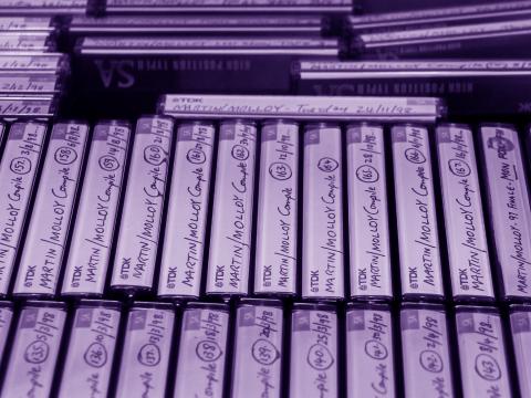 Close up image of rows of labelled cassette tapes