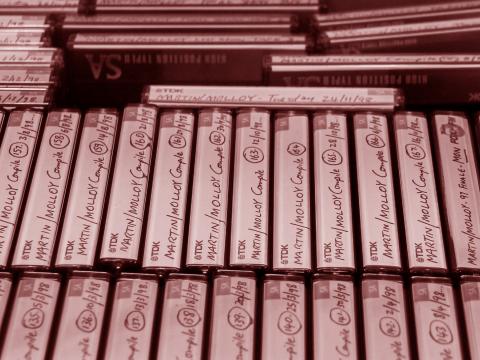 Close up image of rows of labelled cassette tapes