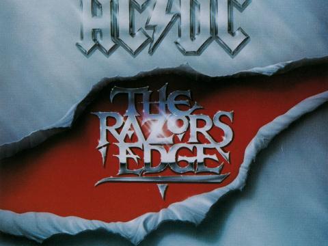 An album cover with text on it that reads 'AC/DC: The Razors Edge'.