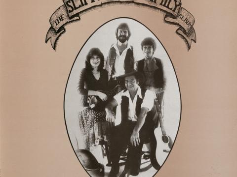 An album cover with a picture of Slim Dusty and his family. The text reads 'Slim Dusty Family'.