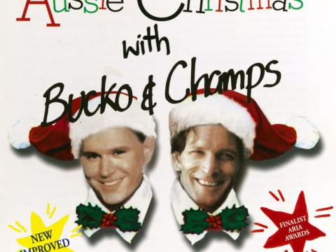 An album cover with two men's faces superimposed with Christmas outfits. The text reads: 'Aussie Christmas with Bucko & Champs'.