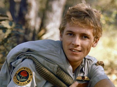 Tony Bonner as Jerry King wearing his ranger costume in the bush.