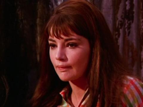 Film still of a young Jeanie Drynan looking worried.