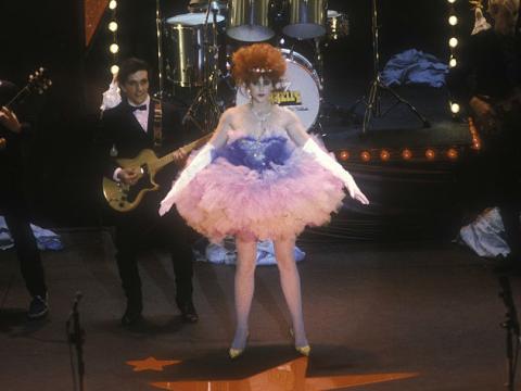 Jo Kennedy in Starstruck performing on stage wearing pink sequined tutu