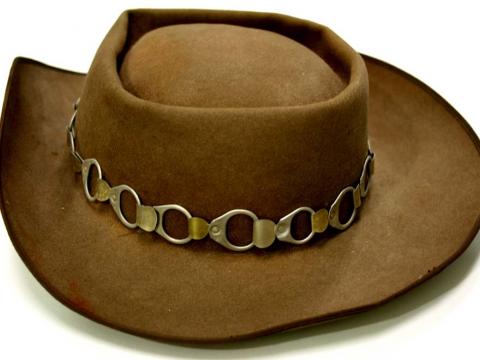 A brown Akubra hat with a beer-can ringpull hat band worn in the film Wake in Fright