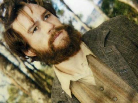 A costume continuity polaroid of Heath Ledger as Ned Kelly in shirt, waistcoat and jacket