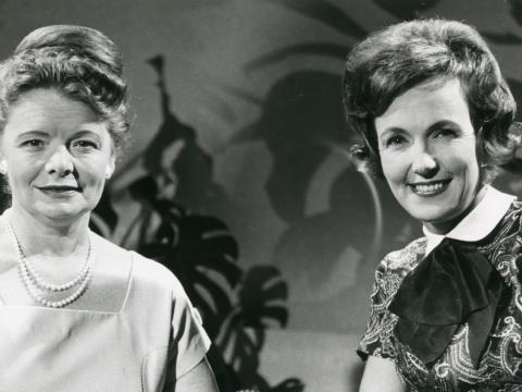 Head and shoulders shot of two women looking directly at camera.