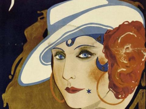 A close-up of a woman's face from a 1929 movie poster