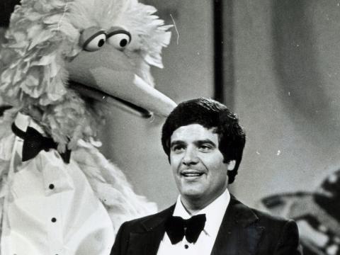 Big Bird from Sesame Street, in a guest appearance at the TV Week Logie Awards in 1983, presents Simon Townsend with an award. 