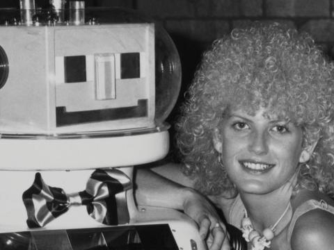 Wonder World! reporter Edith Bliss poses for a photo with Dexter, the robot from the TV dating show Perfect Match.