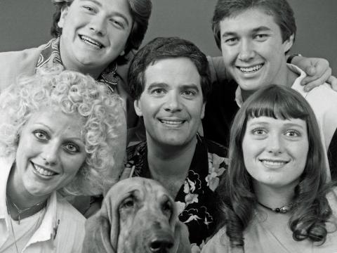 The Wonder World Team, circa 1982. Pictured clockwise from top left: Jonathan Coleman, Simon Townsend, Maurice Parker, Alita Fahey, Woodrow the Bloodhound and Sandy Mauger.