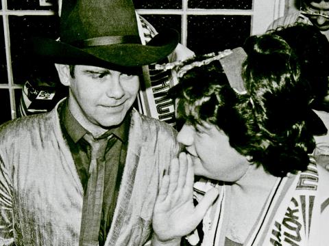 Elton John and Jonathan Coleman at a press event.