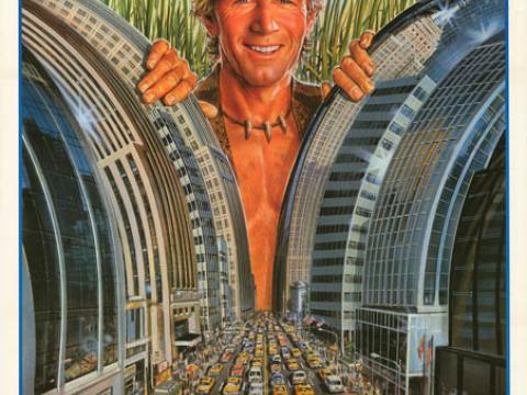 Japanese film poster for Crocodile Dundee showing Mick Dundee smiling as he parts New York City skyscrapers with his hands