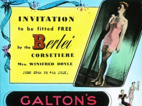 A glass slide advertising the free corsetiere services of Mrs Winifred Do