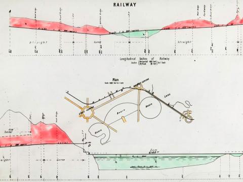 Glass slide showing a plan and two longitudinal section drawings for Walter Burley Griffin's design for the proposed railway, as shown on his Preliminary Plan.