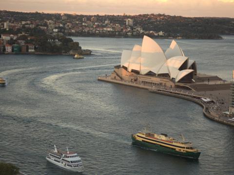 The water around Circular Quay, Sydney. Ferries, harbour cruise boat and Opera House.